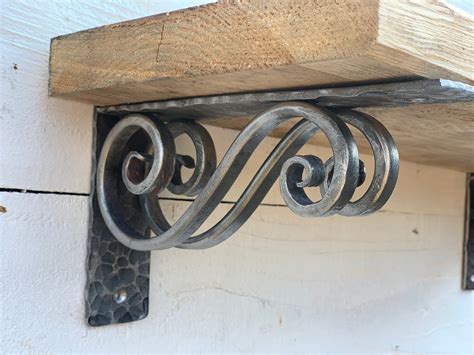 hand forged metal shelf brackets|ironmongery shelf brackets.